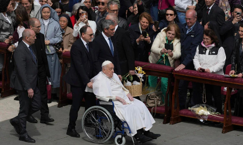 Vaticans solemn run-up to Easter opens with recovering Pope Francis improving but on sidelines