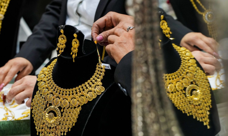 Gold halts record rally, drops Rs 2,400 to Rs 99,200/10 g amid easing US-China tensions Gold halts record rally, drops Rs 2,400 to Rs 99,200/10 g amid easing US-China tensions