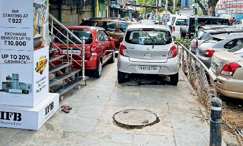 Pavements on Jawaharlal Nehru Salai turns parking space for used car sellers