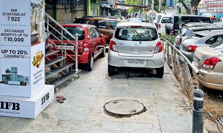 Pavements on Jawaharlal Nehru Salai turns parking space for used car sellers