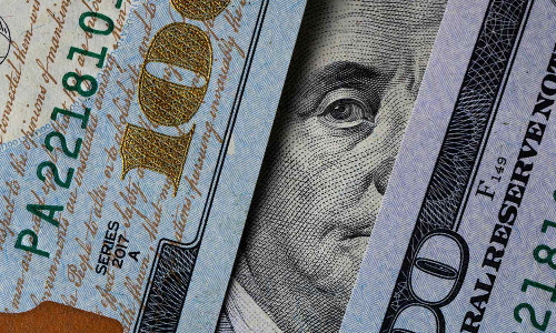 Who benefits from a global dollar?