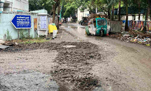 Slippery, slushy road makes rain unbearable for Periyar Nagar residents