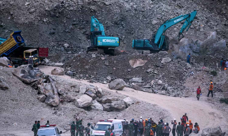 Officials say at least 10 people dead, 6 are missing after stone quarry collapse in Indonesia