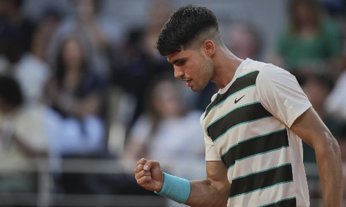 Defending champion Alcaraz labors into fourth round of the French Open