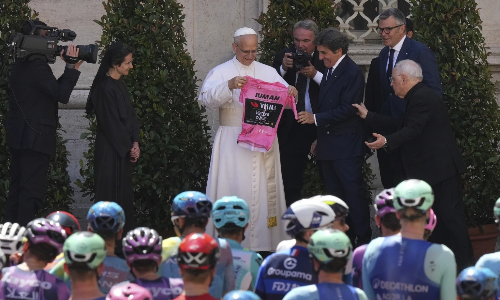 Pope Leo XIV blesses cyclists competing in the Giro dItalia as final stage enters Vatican gardens