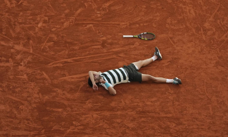 Alcaraz wins longest French Open final in five sets after saving 3 match points against Sinner