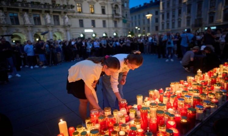 Austria falls silent for minute as questions remain about motive for deadly school shooting