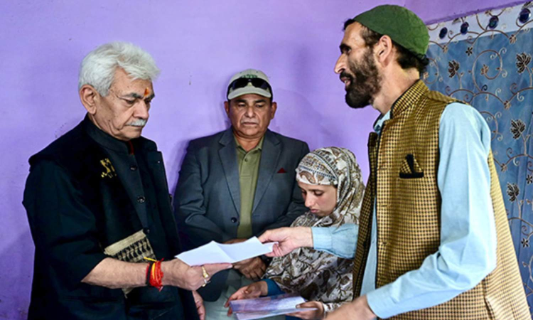 J&K L-G hands over job letter to wife of pony ride operator killed in Pahalgam terror attack J&K L-G hands over job letter to wife of pony ride operator killed in Pahalgam terror attack