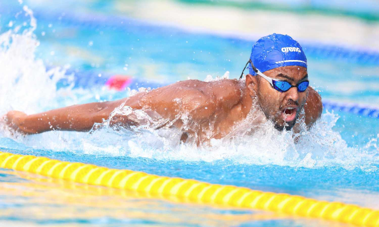 Benedicton sets National record en route to 100m butterfly gold