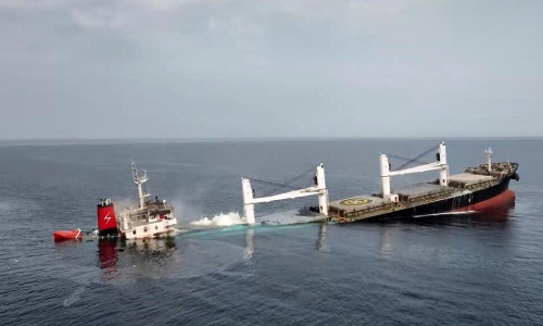 Rescuers search for missing crew from Red Sea attack as US alleges Yemen rebels may have them