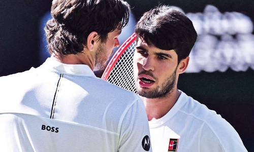 Alcaraz ends Fritz bid, reaches third consecutive Wimbledon final