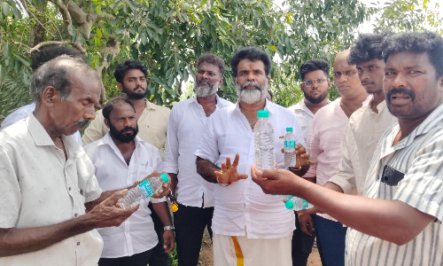Locals in Ponneri stage protest after man finds dead lizard in packaged water bottle