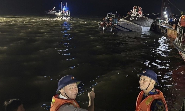 Tourist boat capsizes during thunderstorm in Vietnam, leaving 34 dead; 8 people remain missing