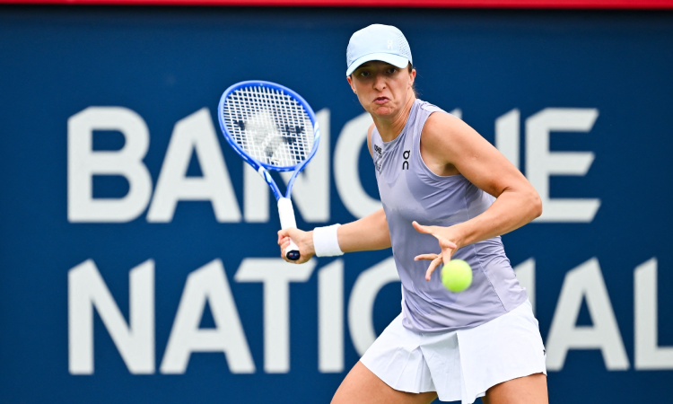 Swiatek easily advances in Montreal in first match since Wimbledon victory