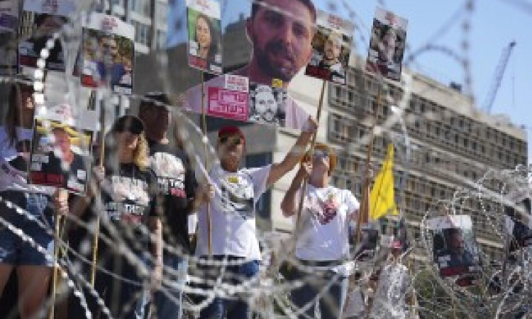 Israeli forces kill over 20 people seeking food in Gaza, say witnesses, health officials