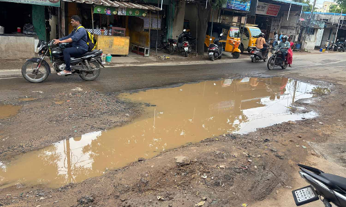 Chennai Citizen Connect | Drain repair done, road repair pending: Tiruvottiyur High Road users in constant threat Chennai Citizen Connect | Drain repair done, road repair pending: Tiruvottiyur High Road users in constant threat