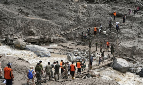 Flash floods kill more than 280 people in India and Pakistan as thousands flee