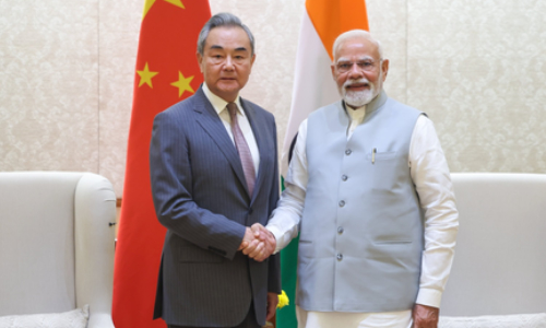 Chinese Foreign Minister Wang Yi calls on PM Modi