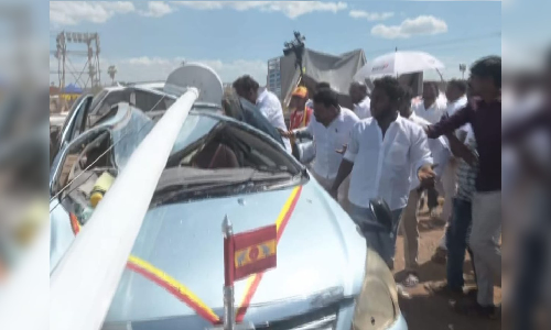 100-foot iron pole crashes on car at TVK conference venue in Madurai