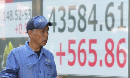 Global shares rise after Japans prime minister announces plan to resign