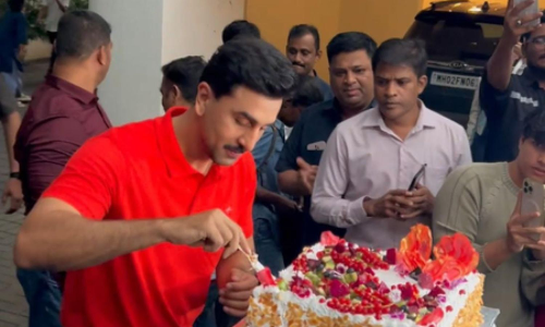Ranbir Kapoor celebrates his 43rd birthday with the media by cutting a massive cake