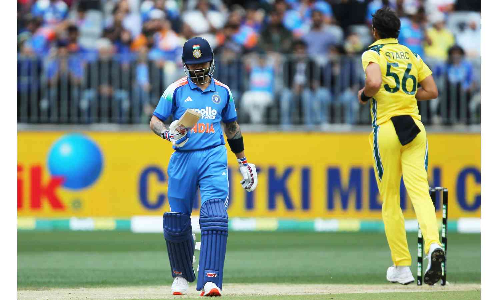 Kohli, Rohit misfire as India labour to 136/9 in rain-hit first ODI against Australia