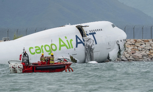 Cargo aircraft skids off Hong Kong airport runway into sea, 2 dead Cargo aircraft skids off Hong Kong airport runway into sea, 2 dead