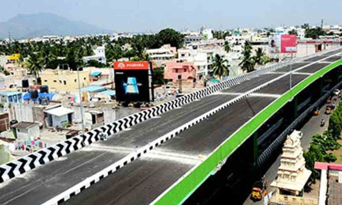 Chennai: Exposed steel rods and potholes pose risk for commuters using Koyambedu flyover
