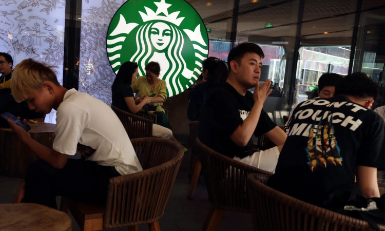 Starbucks sells 60 pc stake in China business in USD 4 billion deal