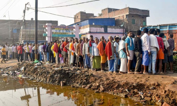 Bihar polls: Flooded roads, 20-year wait for booth to return to village as voters bat for democracy