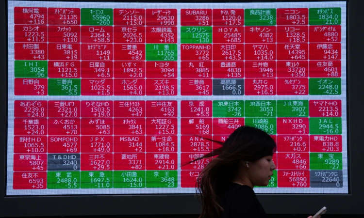 Asian shares advance as tech shares rebound from AI jitters