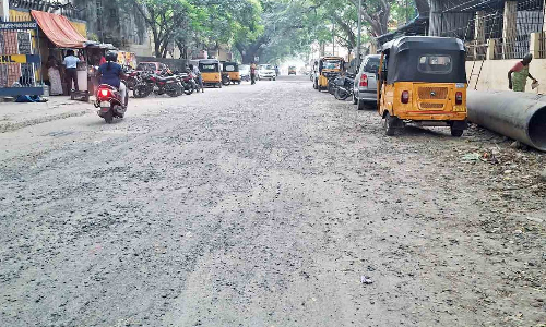 Chennai: Incomplete re-laying work leaves Bharathidasan Colony Main Road dusty, slippery