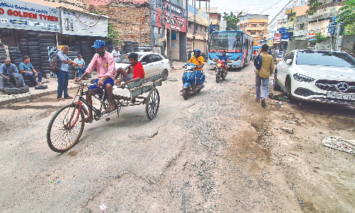 Motorists fume over damaged Thiru Vi Ka Road