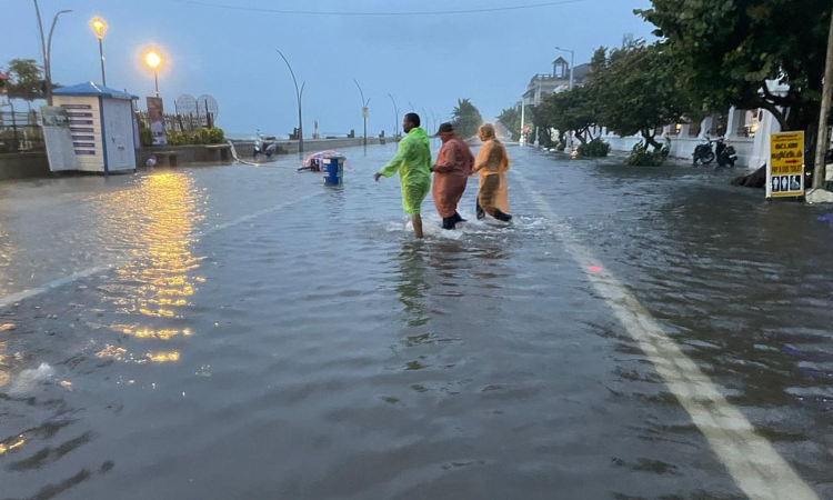 Water pooled along a coastal road in Puducherry
