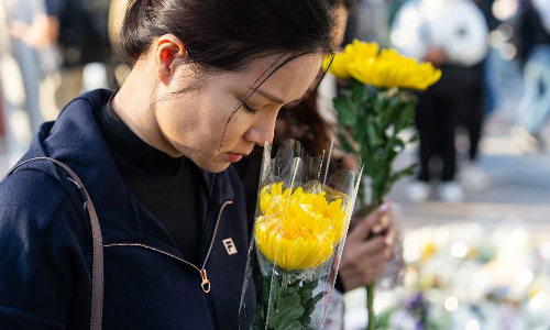 Hong Kong mourns as deadly fire claims 128 lives and sparks safety crackdown Hong Kong mourns as deadly fire claims 128 lives and sparks safety crackdown