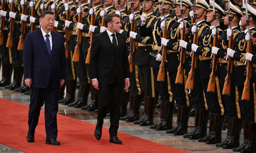 Chinas Xi and Frances Macron pledge cooperation on global crises and trade