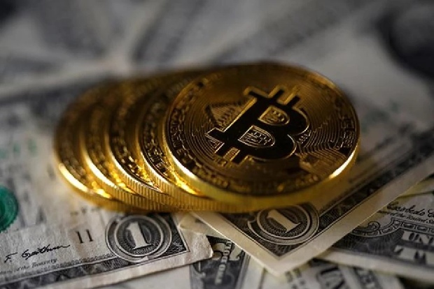 Bitcoin holds ground after touching highest this year