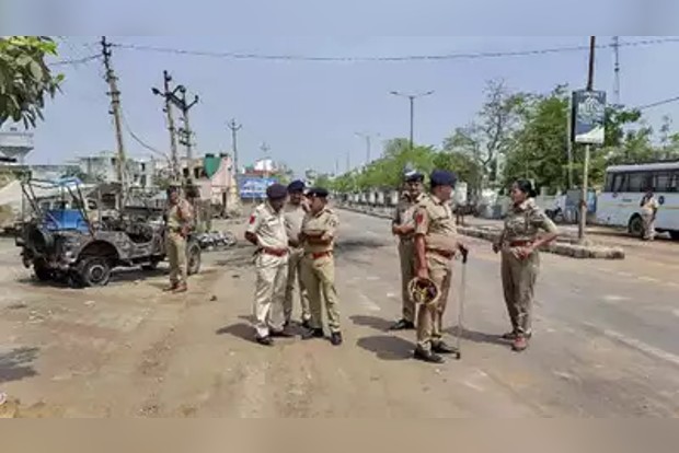 Curfew in Khargone city after stone pelting at Ram Navami procession triggers arson; 77 arrested Curfew in Khargone city after stone pelting at Ram Navami procession triggers arson; 77 arrested