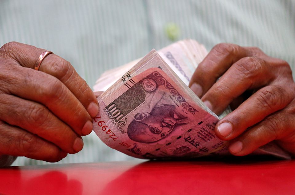 Rupee falls 14 paise to 76.05 against US dollar in early trade