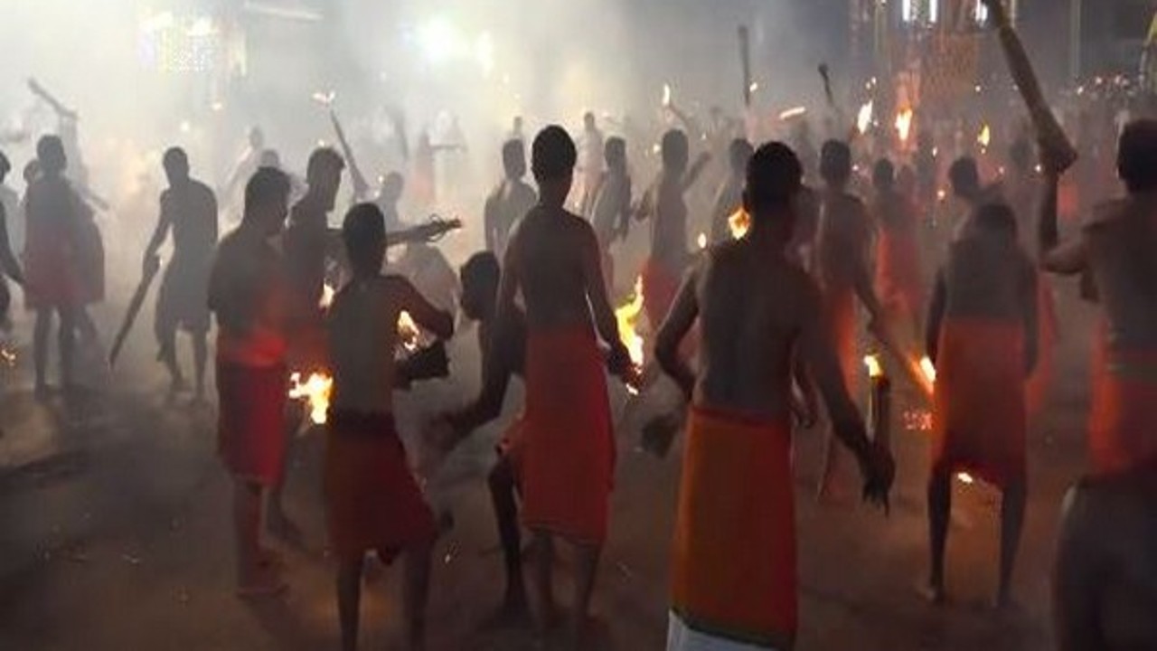 Devotees take part in fire ritual in Karnataka temple