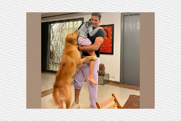 Akshay Kumar adorably hugs his daughter, pet dog in this picture
