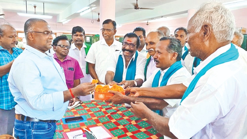 Elated ryots distribute sweets in central dists