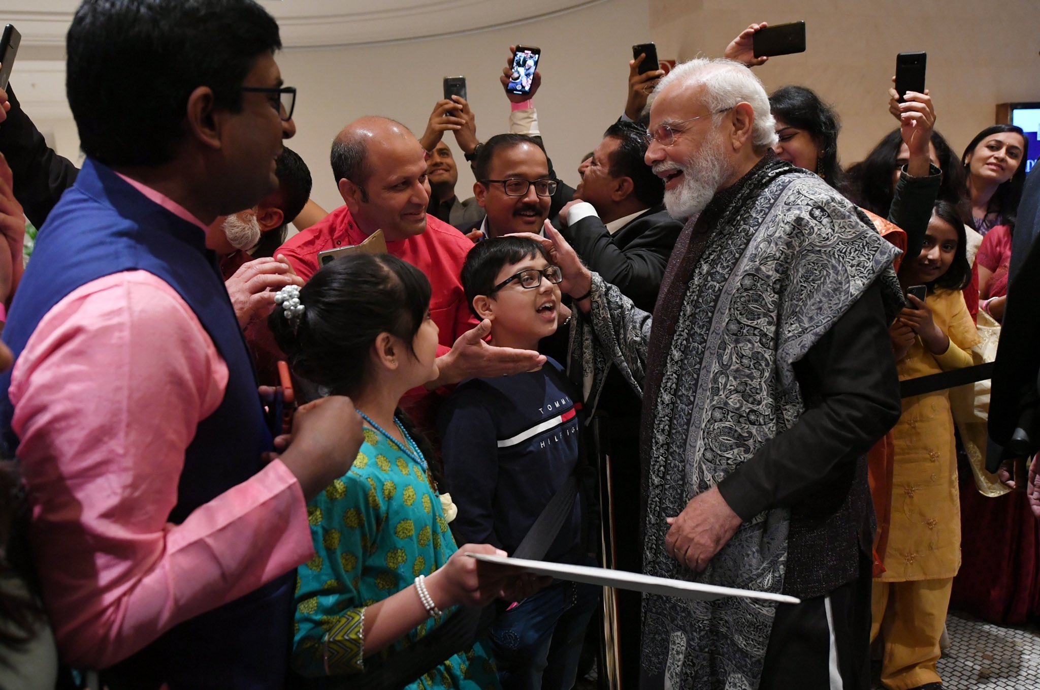 Indian-origin kids sing, present portrait of Modi during Germany visit