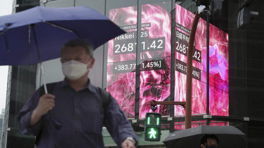 Asian shares mixed as markets eye US interest rates, prices