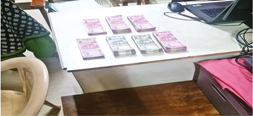 Commercial Tax official, clerk held for taking Rs 9L bribe
