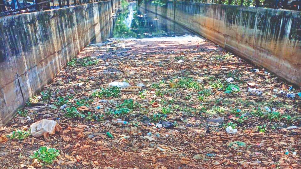North canal choked with plastic waste in Korattur
