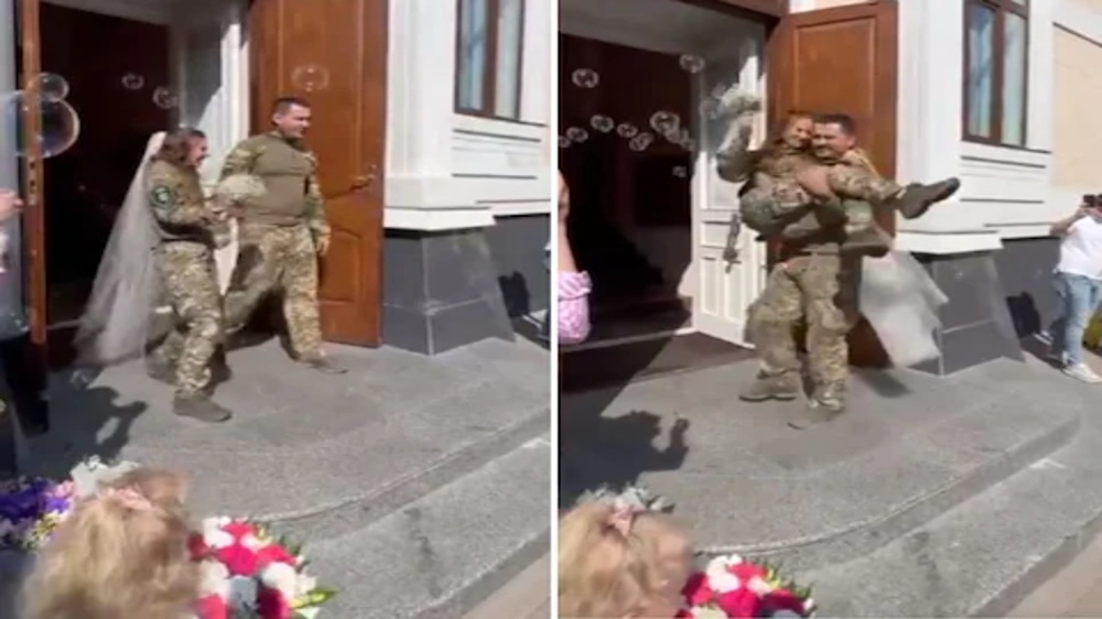 Not wedding dresses but military uniforms for Ukrainian couple Not wedding dresses but military uniforms for Ukrainian couple