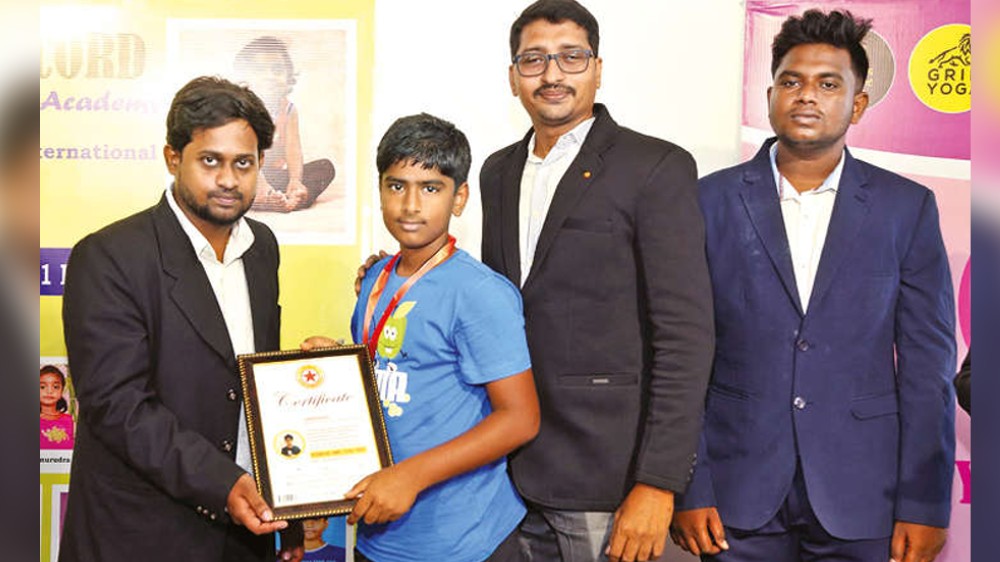 School boy creates world record by holding Baddha Konasan for an hr School boy creates world record by holding Baddha Konasan for an hr