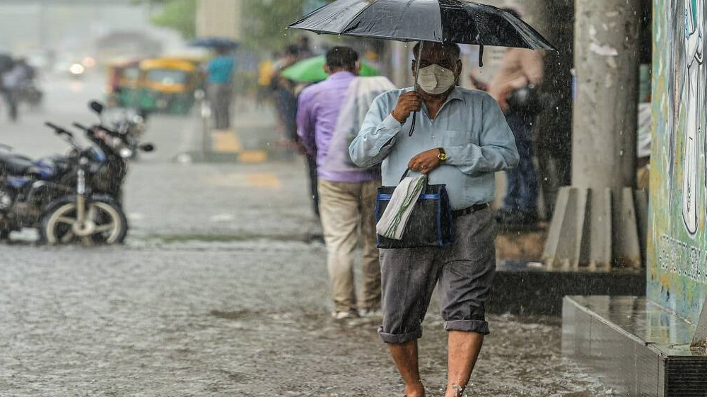 Three killed as heavy rain lashes Karnataka, IMD issues orange alert