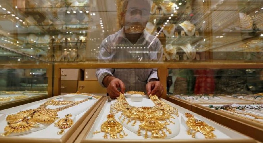 Gold declines Rs 205; silver tumbles by Rs 964